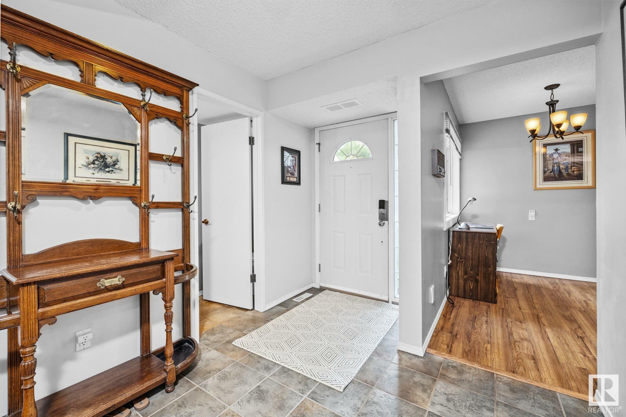 Property Photo: 2737 124 Street NW AB T6J 4T2