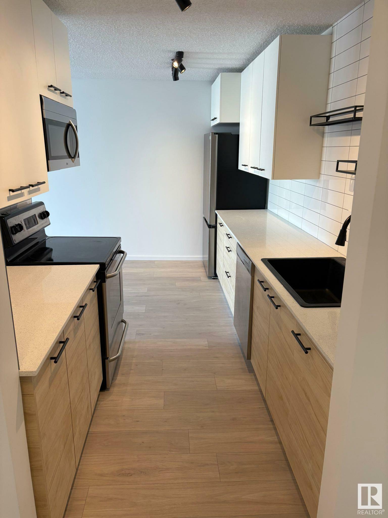 Property Photo: 10615 110 Street NW 302 AB T5H 3C7