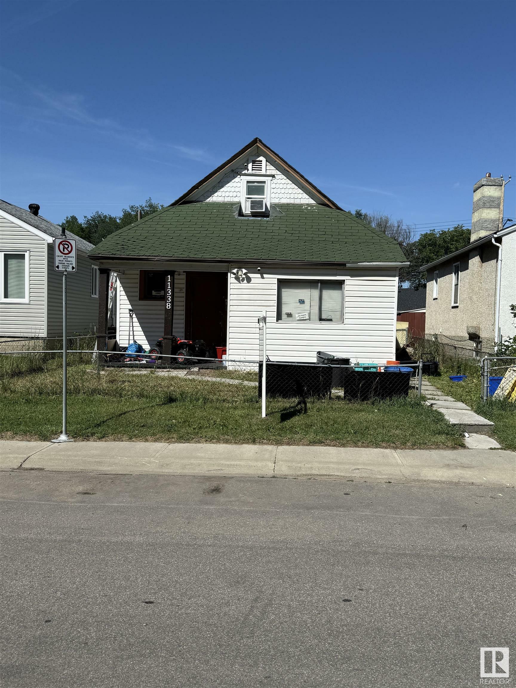 Property Photo:  11338 83 Street NW  AB T5B 2Y1 