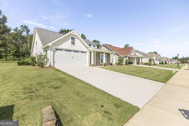 Property Photo:  203 Cherokee Rose Circle  GA 31021 