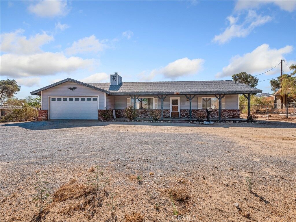 Property Photo:  7423 Palomar Avenue  CA 92284 