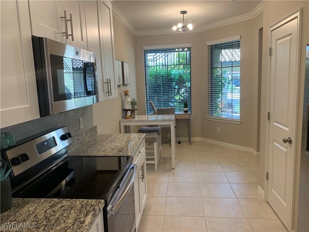 Property Photo: 9433 Benvenuto Court 5-101 FL 34119