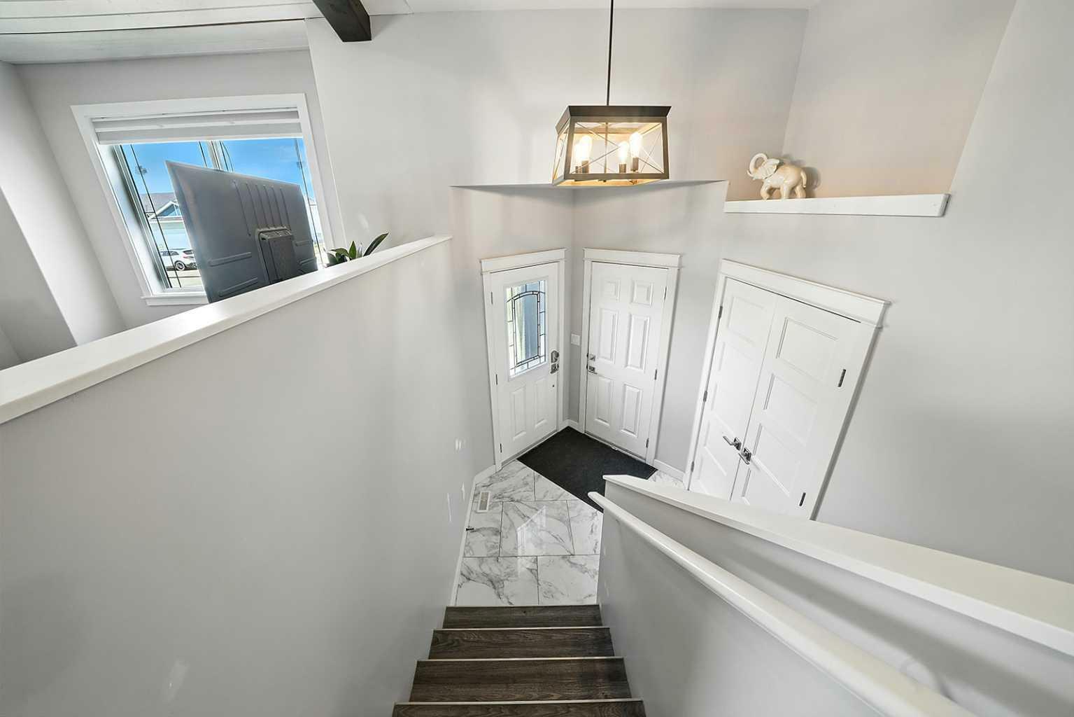 Property Photo: 5 Mackenzie Avenue AB T4L 0A6