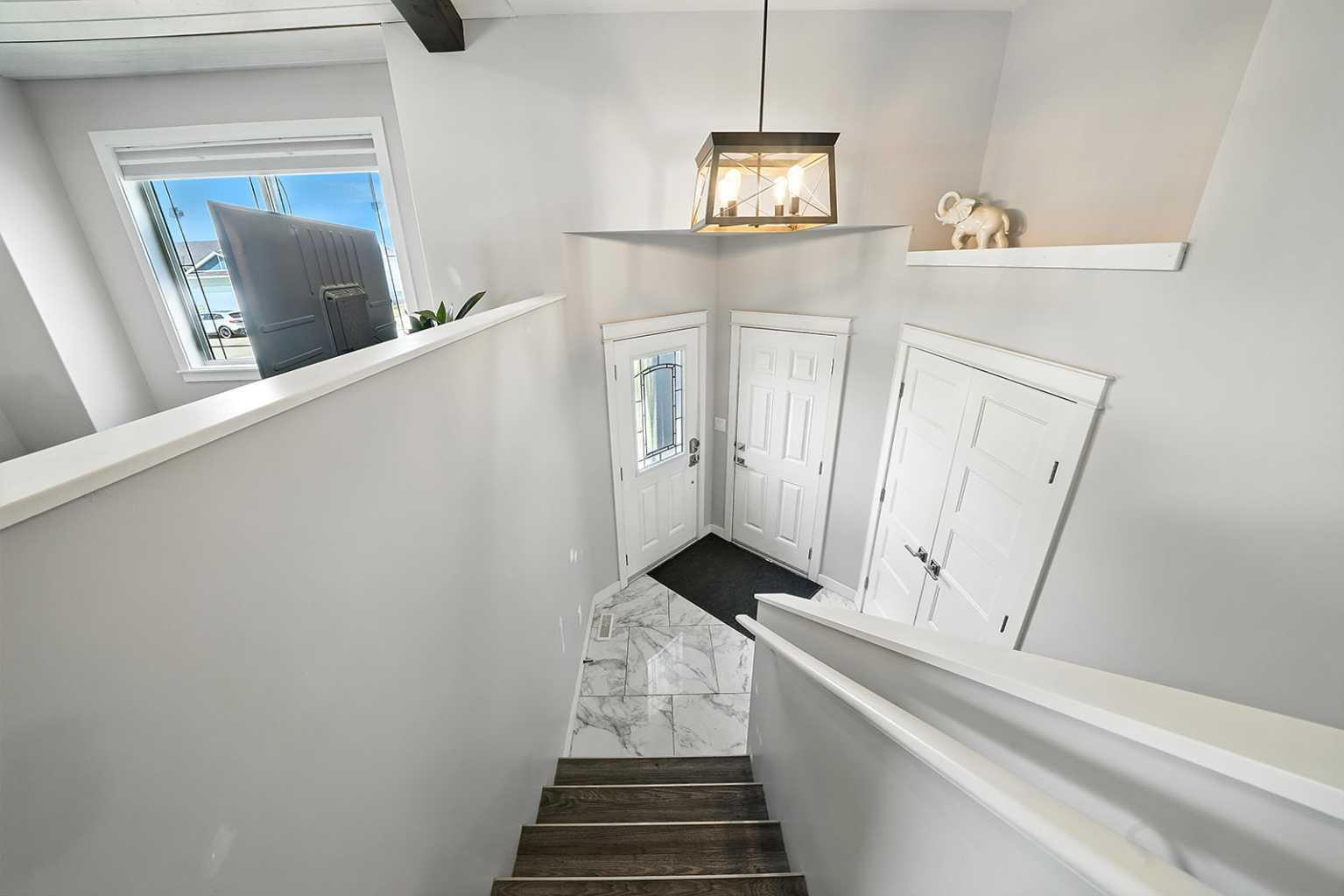 Property Photo: 5 Mackenzie Avenue AB T4L 0A6