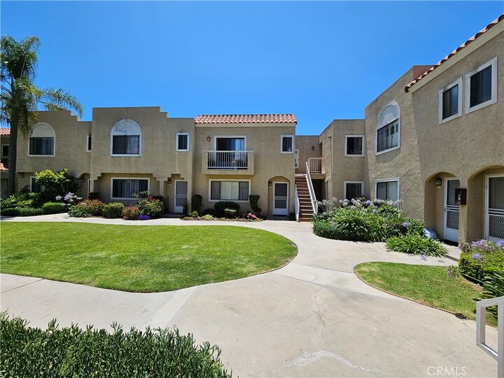 Property Photo:  13171 Newland Street 11  CA 92844 