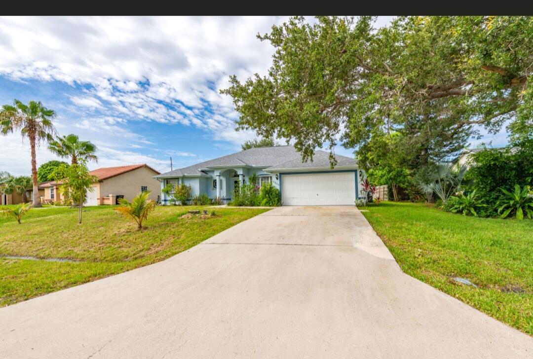 Property Photo: 2826 SW Ann Arbor Road FL 34953