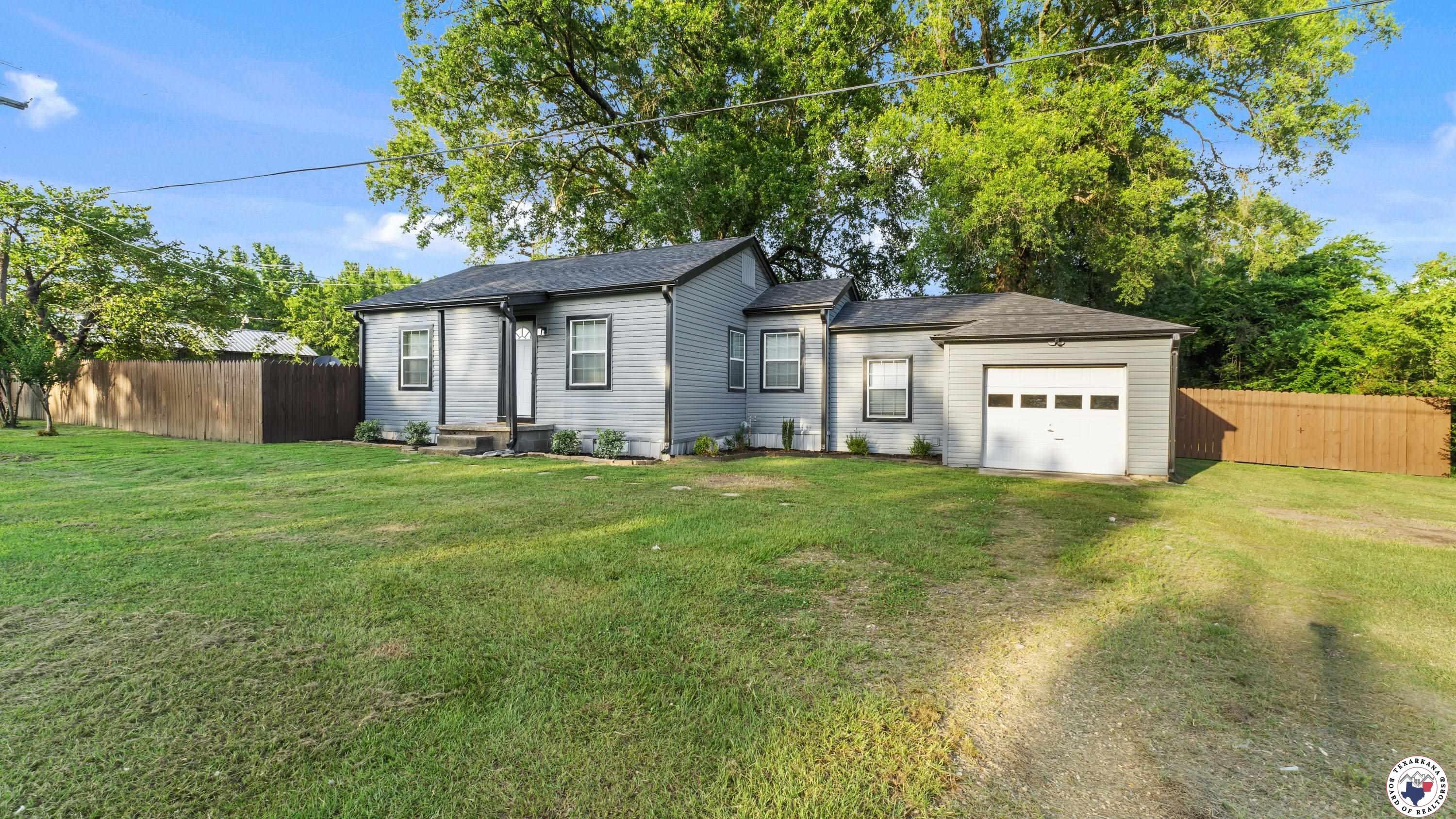 Property Photo:  405 Red River Road S  TX 75573 