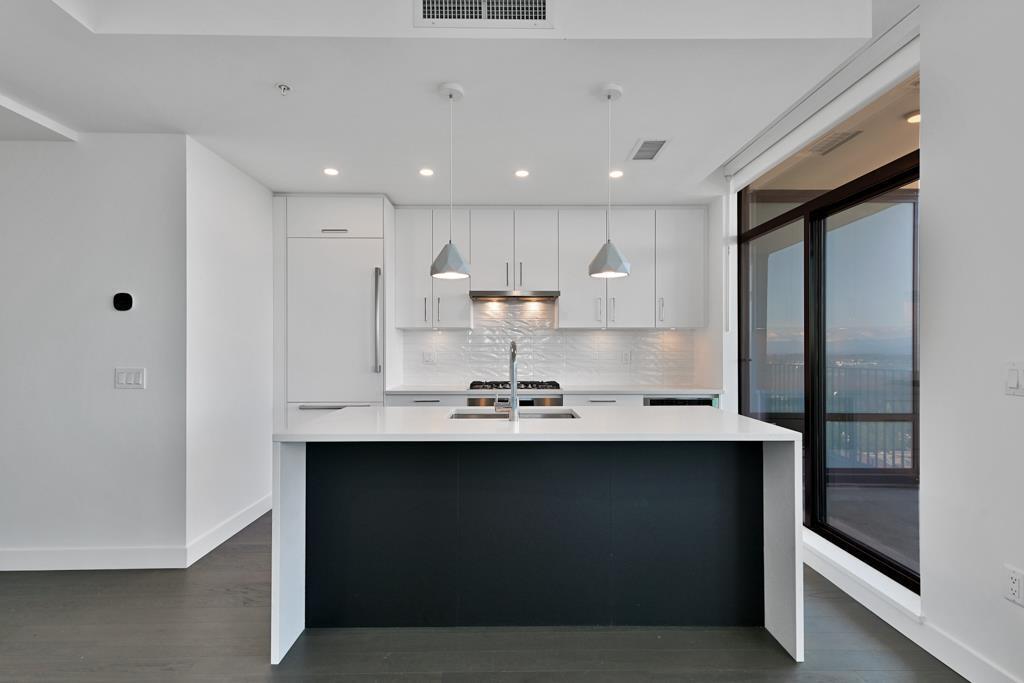 Property Photo:  1588 Johnston 1902  BC V4B 3Z7 