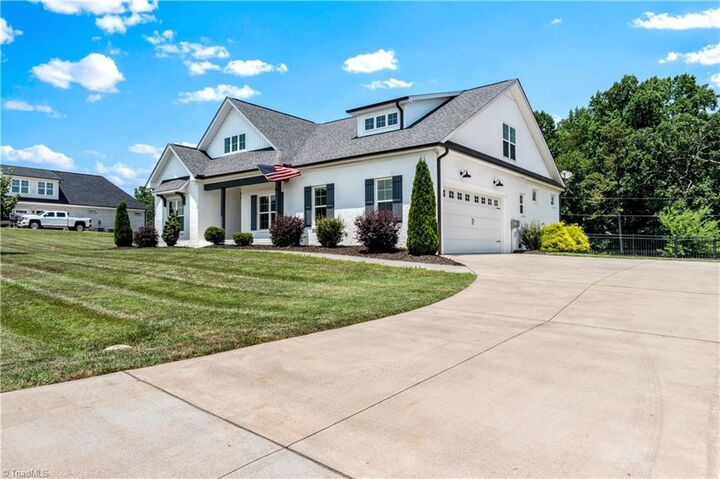 Property Photo:  121 Beauchamp Oaks Court  NC 27006 