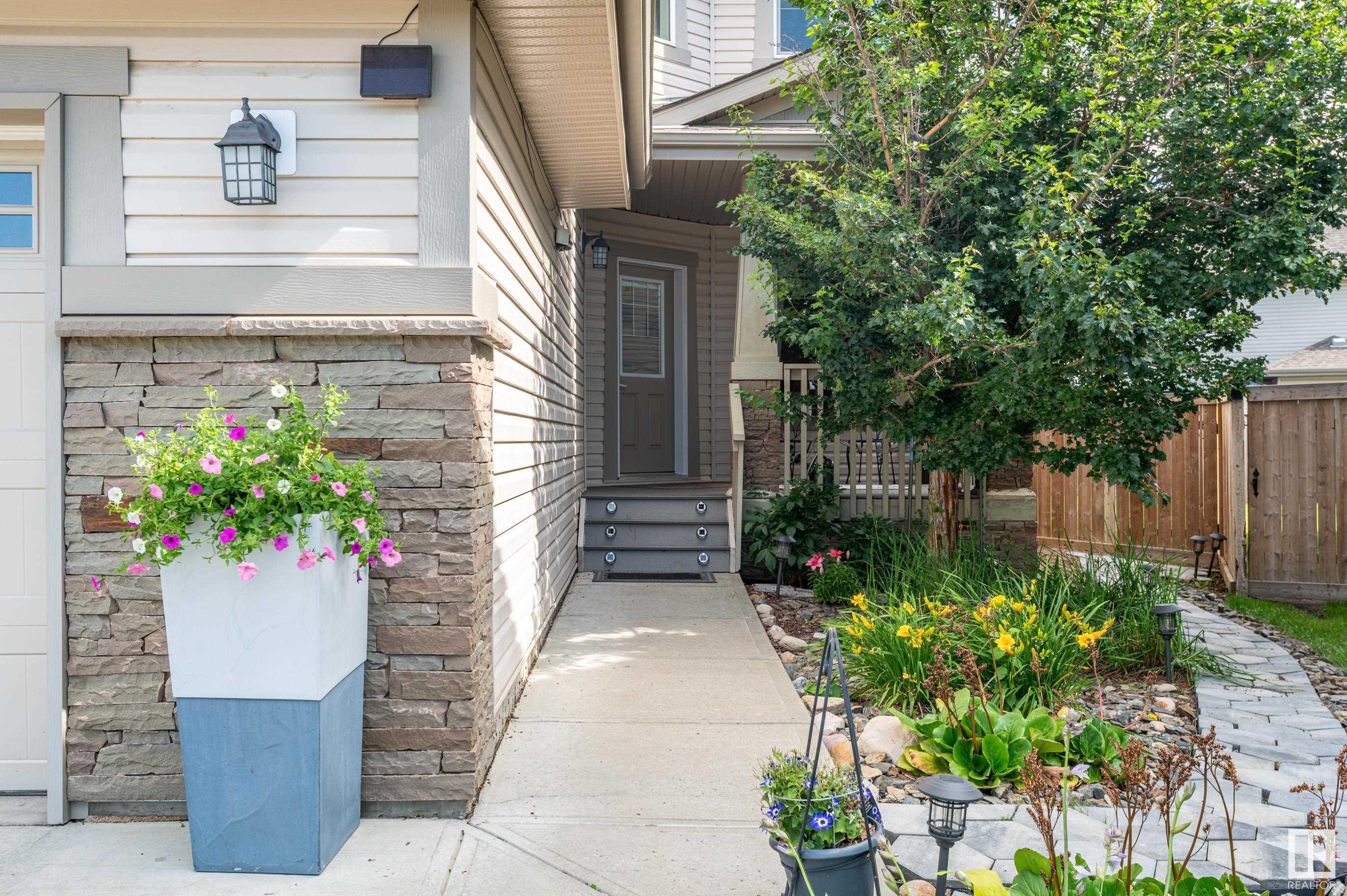 Property Photo: 2108 Trumpeter Way NW AB T5S 0G1