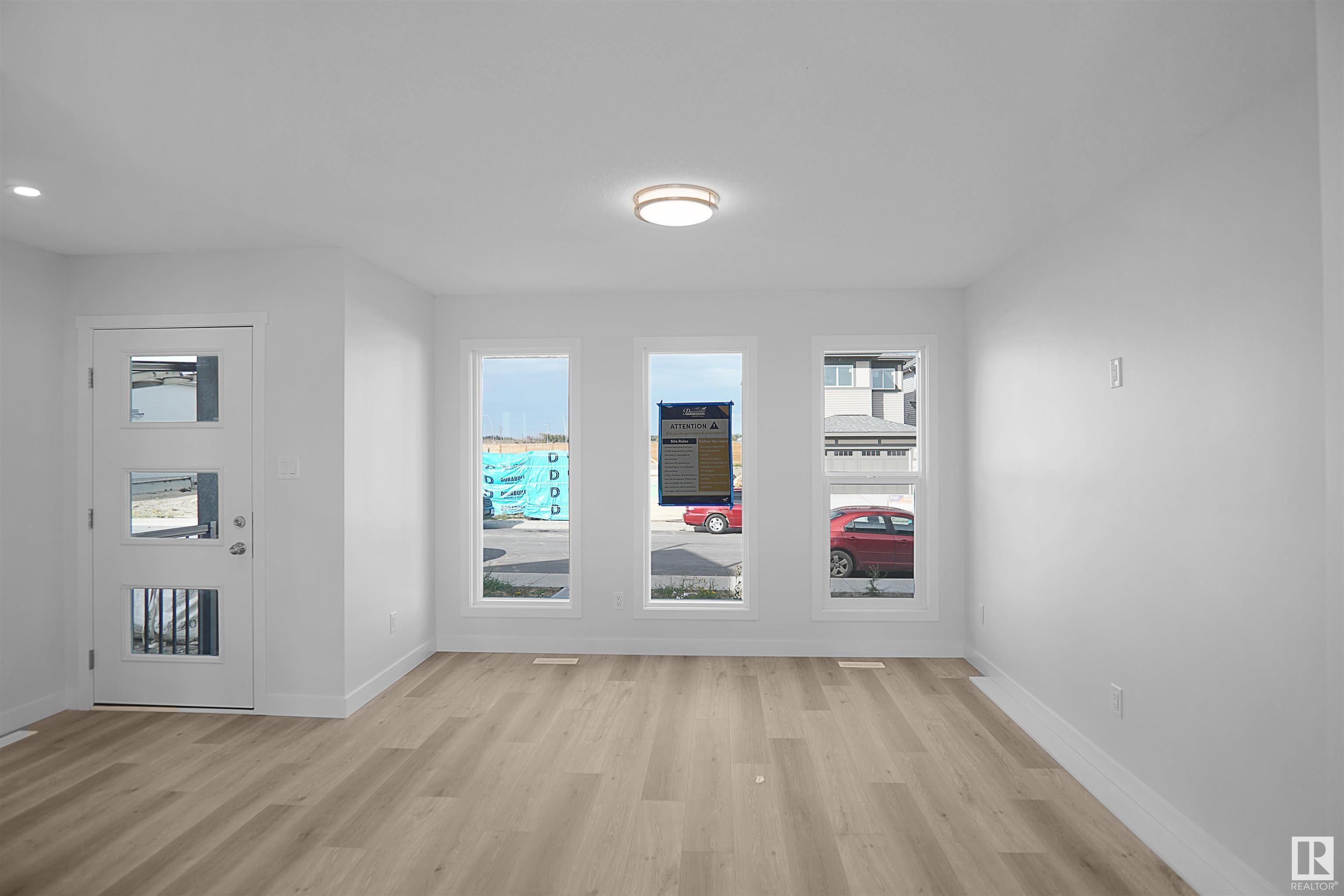 Property Photo:  21035 25 Avenue NW  AB T5Y 4G2 