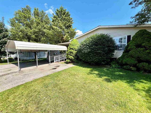 Property Photo: 2500 Mann Road, Lot 83 MI 48346