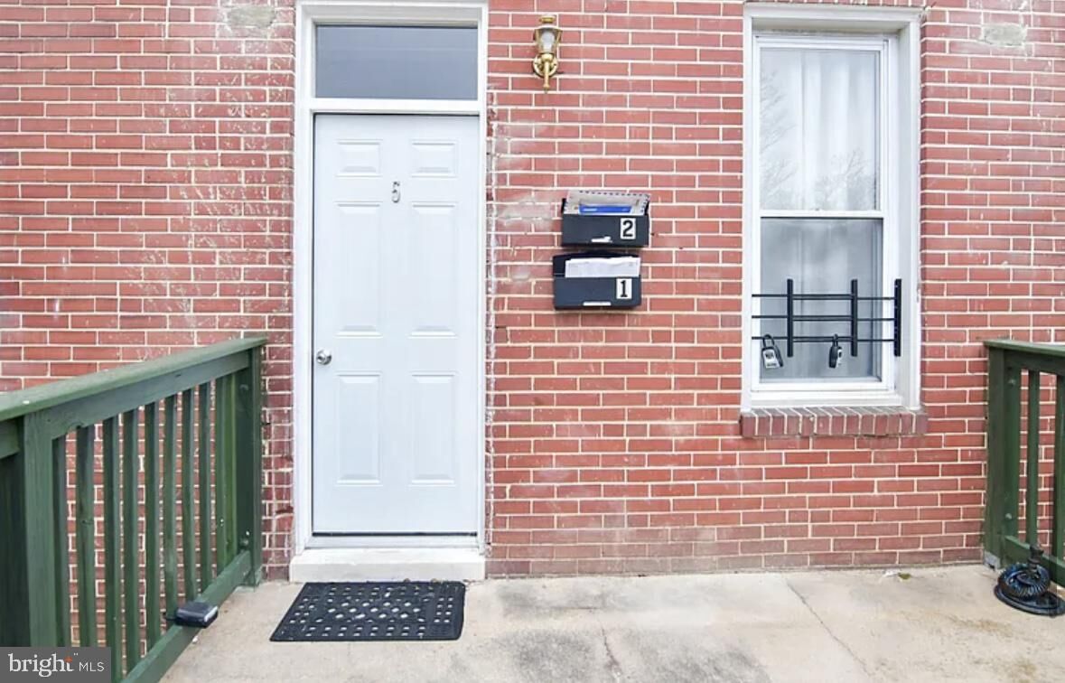 Property Photo:  5 S Wickham Road Unit 1  MD 21229 
