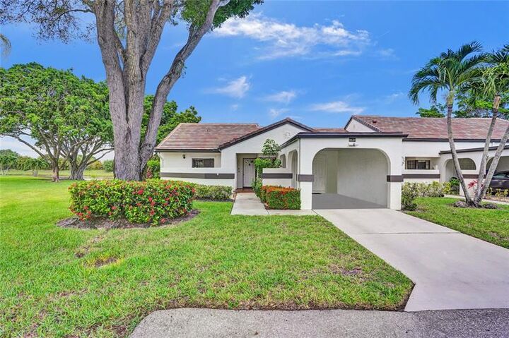 Property Photo:  5658 Parkwalk Circle East  FL 33472 