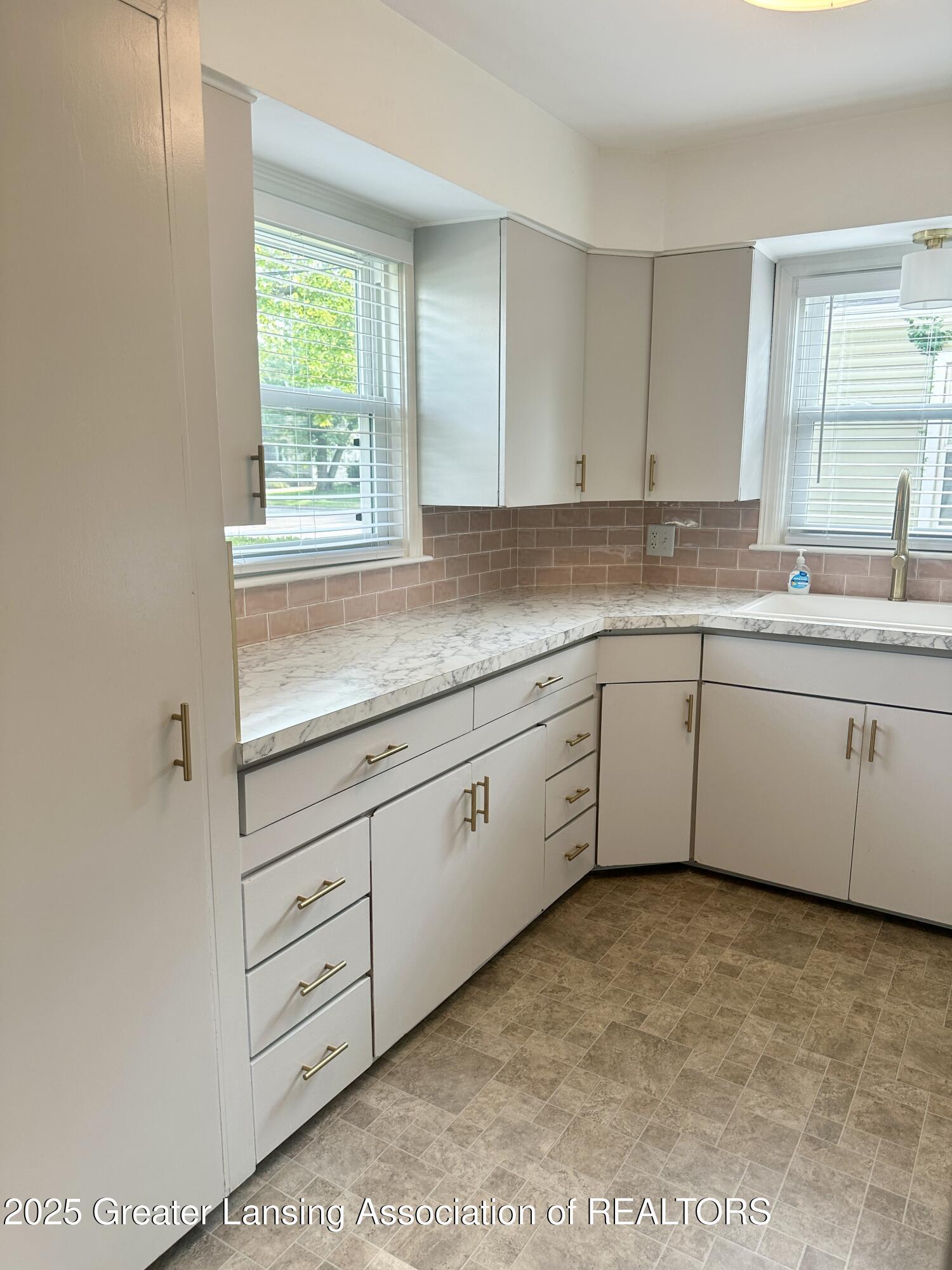 Property Photo: 1420 Cooper Avenue MI 48910