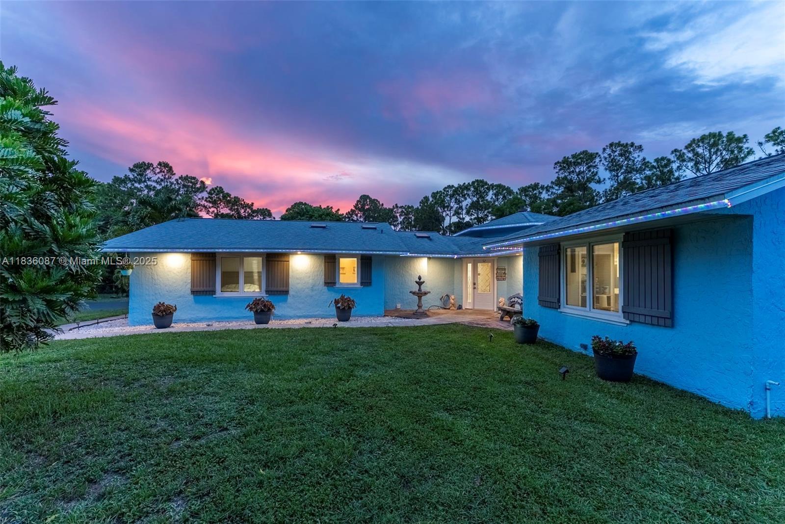Property Photo: 10709 N 159th Ct N FL 33478