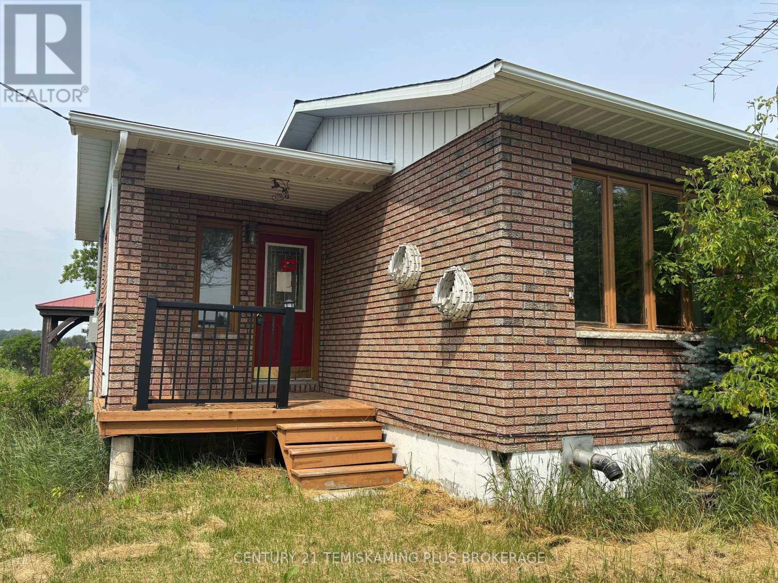 Property Photo:  881375 Highway 65 East  ON P0J 1P0 