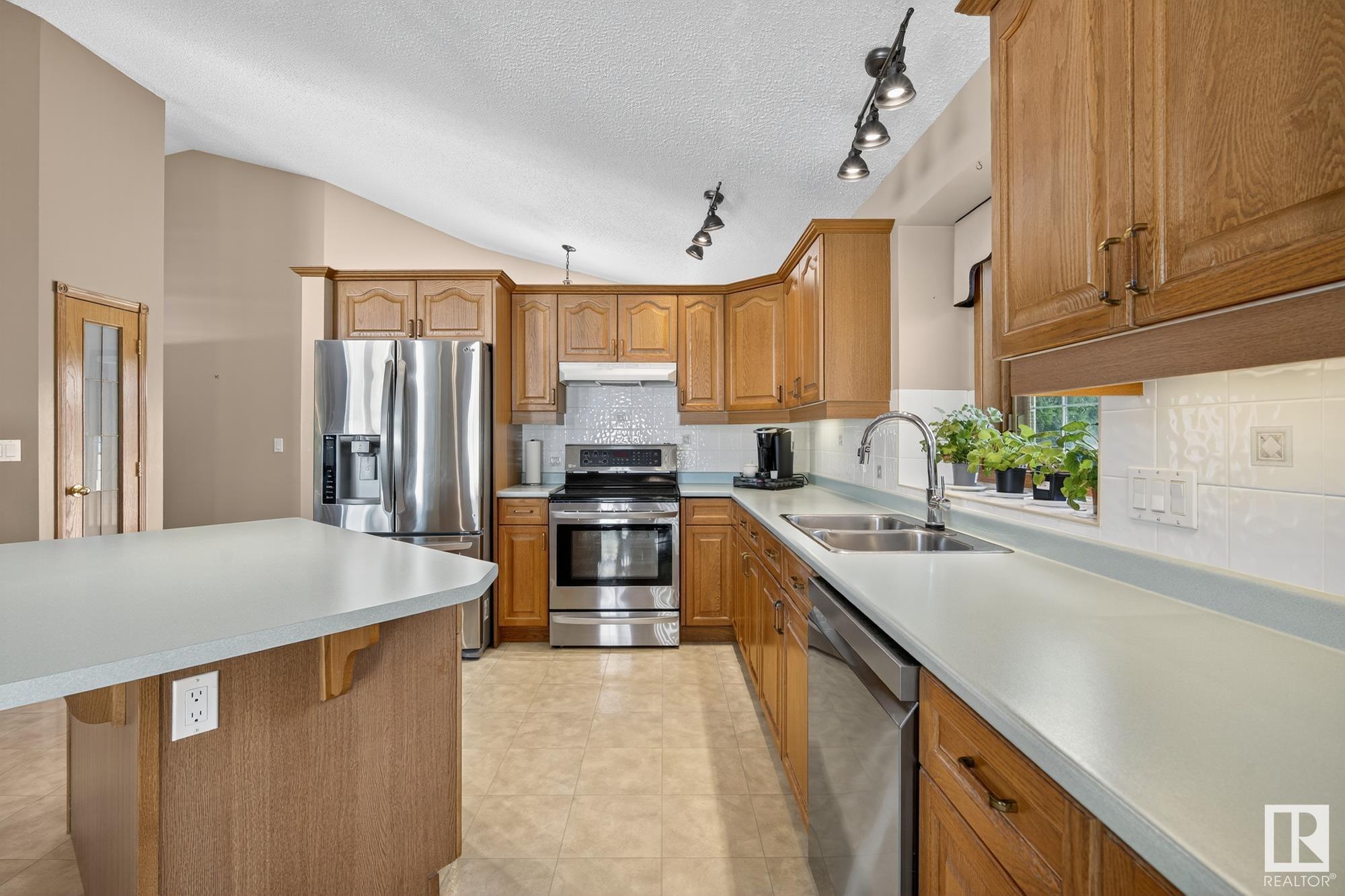 Property Photo:  5052 152A Avenue NW  AB T5A 5E7 