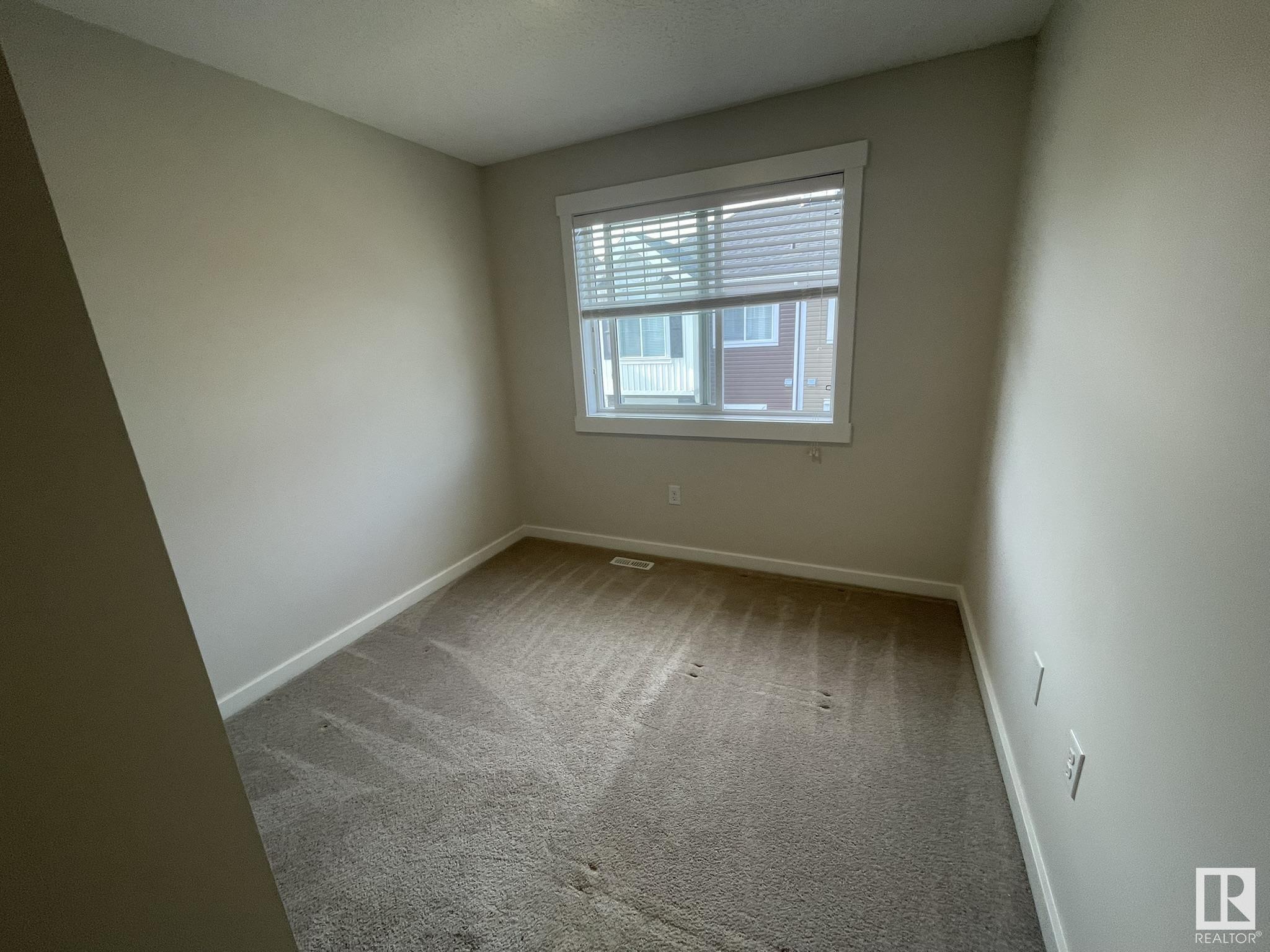 Property Photo: 903 Crystallina Nera Way NW 98 AB T5Z 0N6
