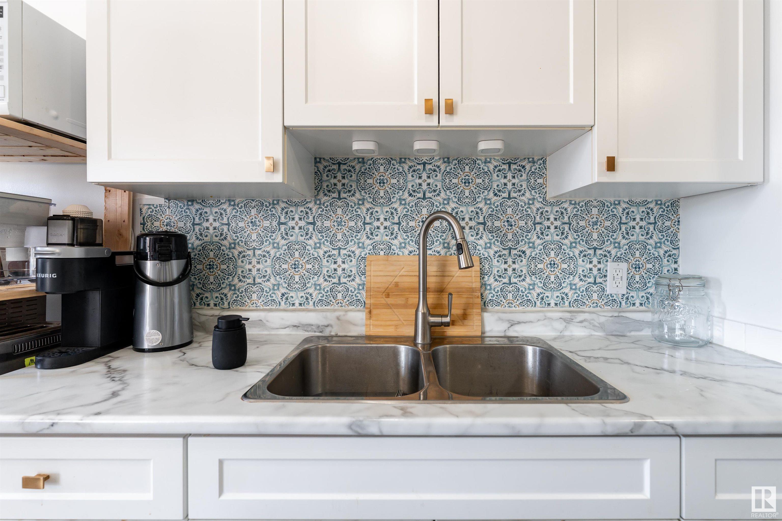 Property Photo: 8930 149 Street NW 203 AB T5R 1B8