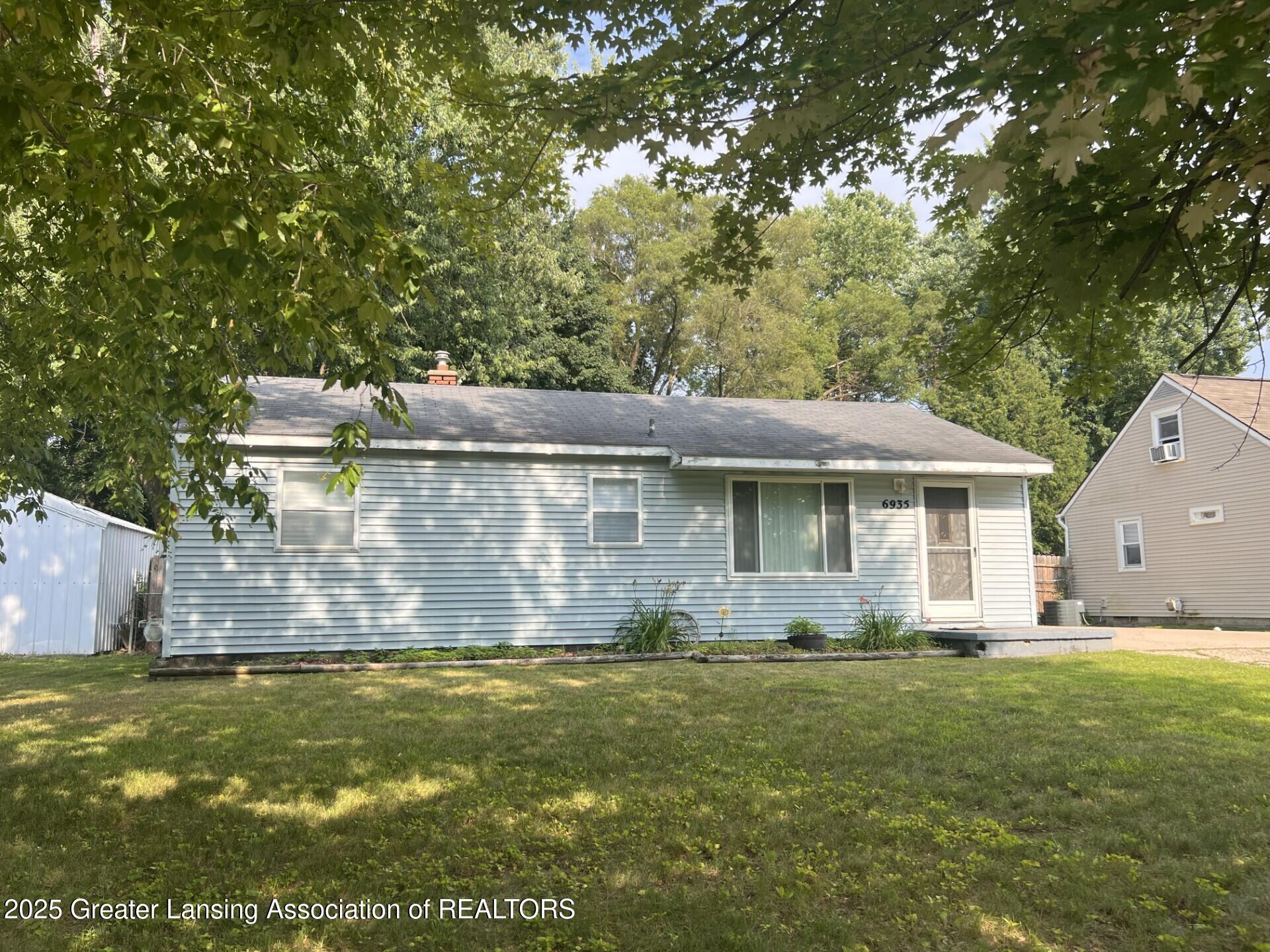 Property Photo:  6935 Cooper Road  MI 48911 