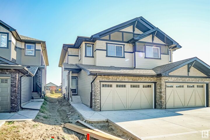 Property Photo: 113 Ficus Way AB T8L 0Z6