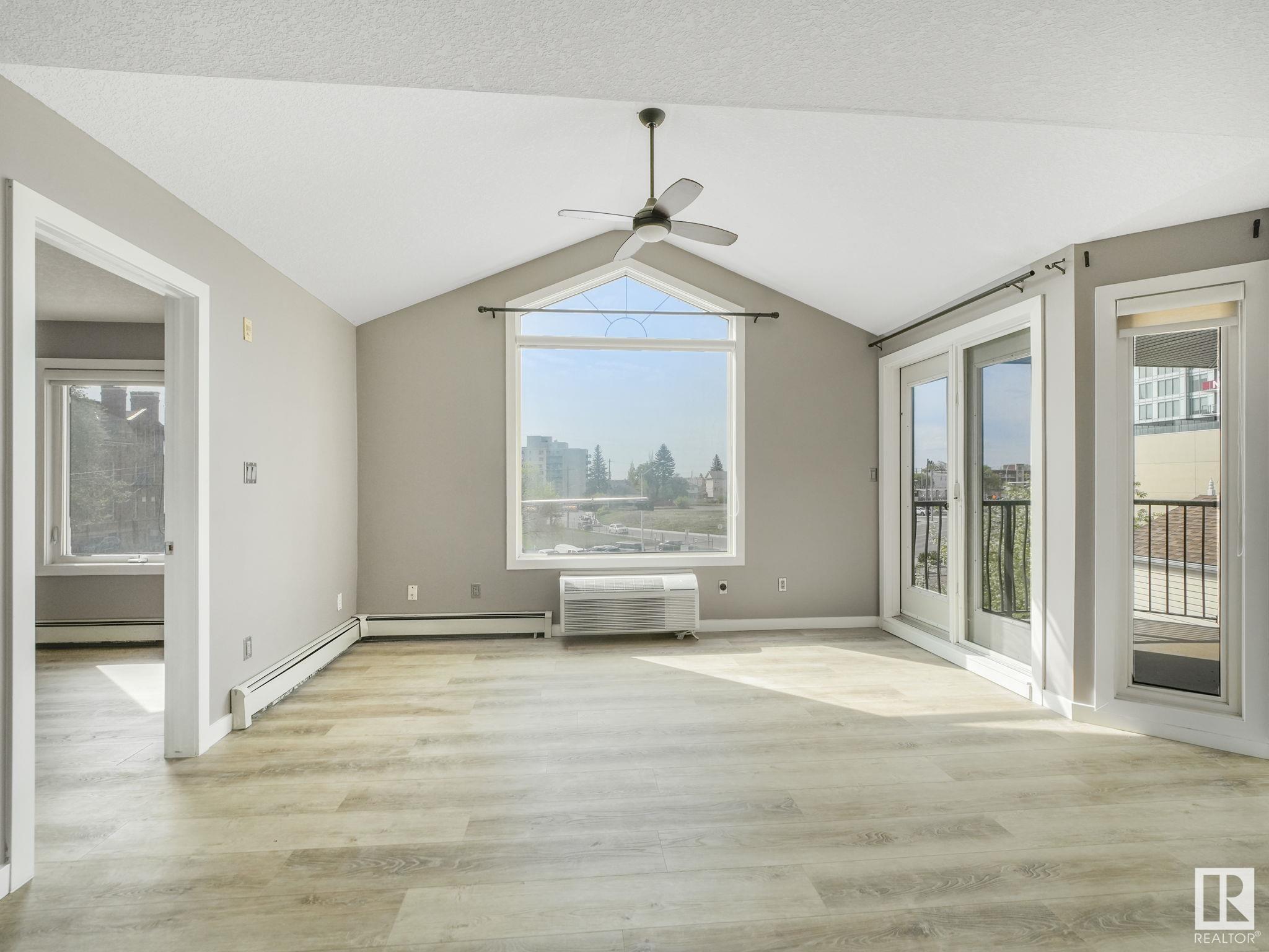 Property Photo: 9336 Jasper Avenue NW 303 AB T5H 3T5