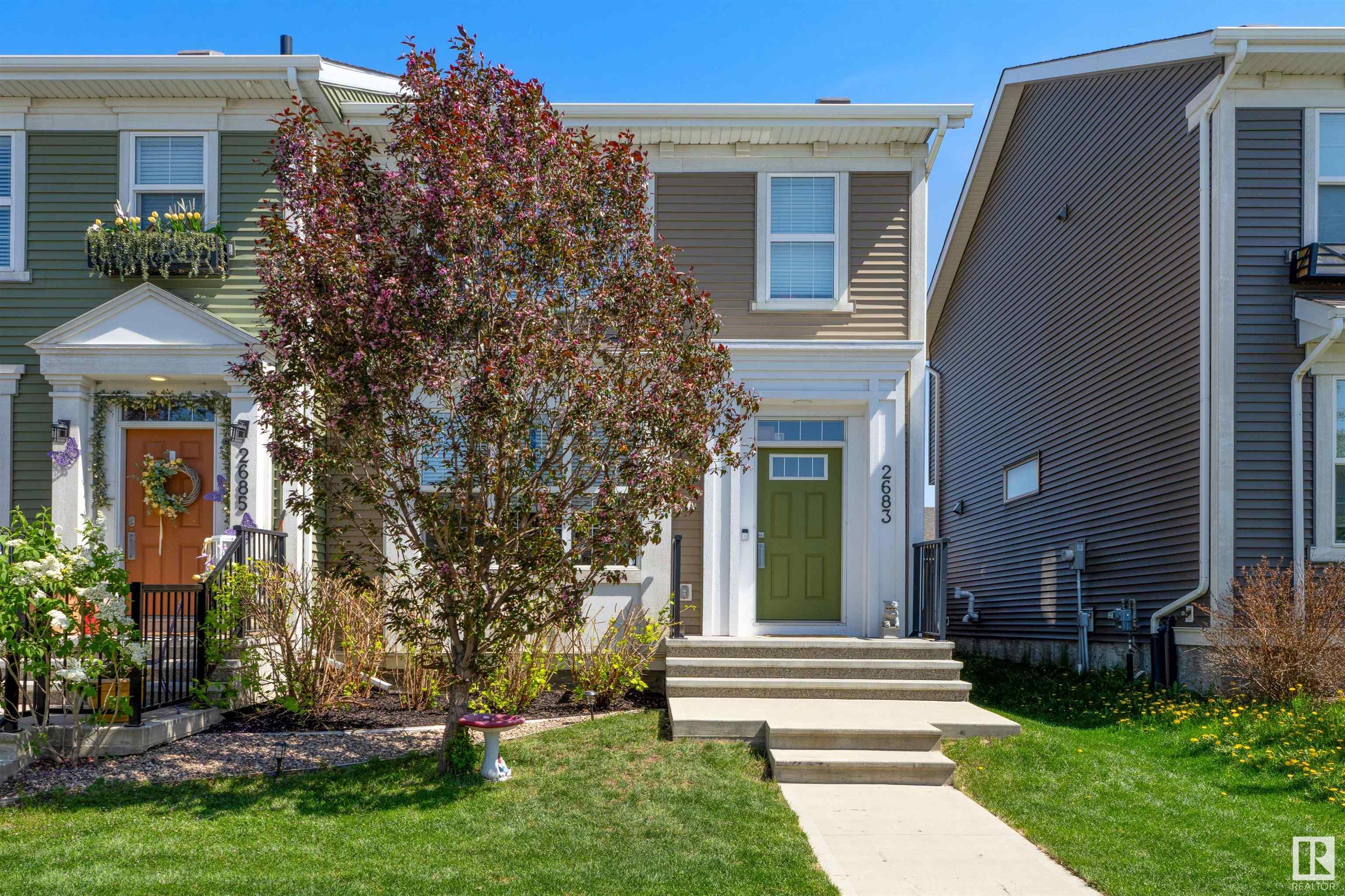Property Photo: 2683 Maple Way NW AB T6T 2C8