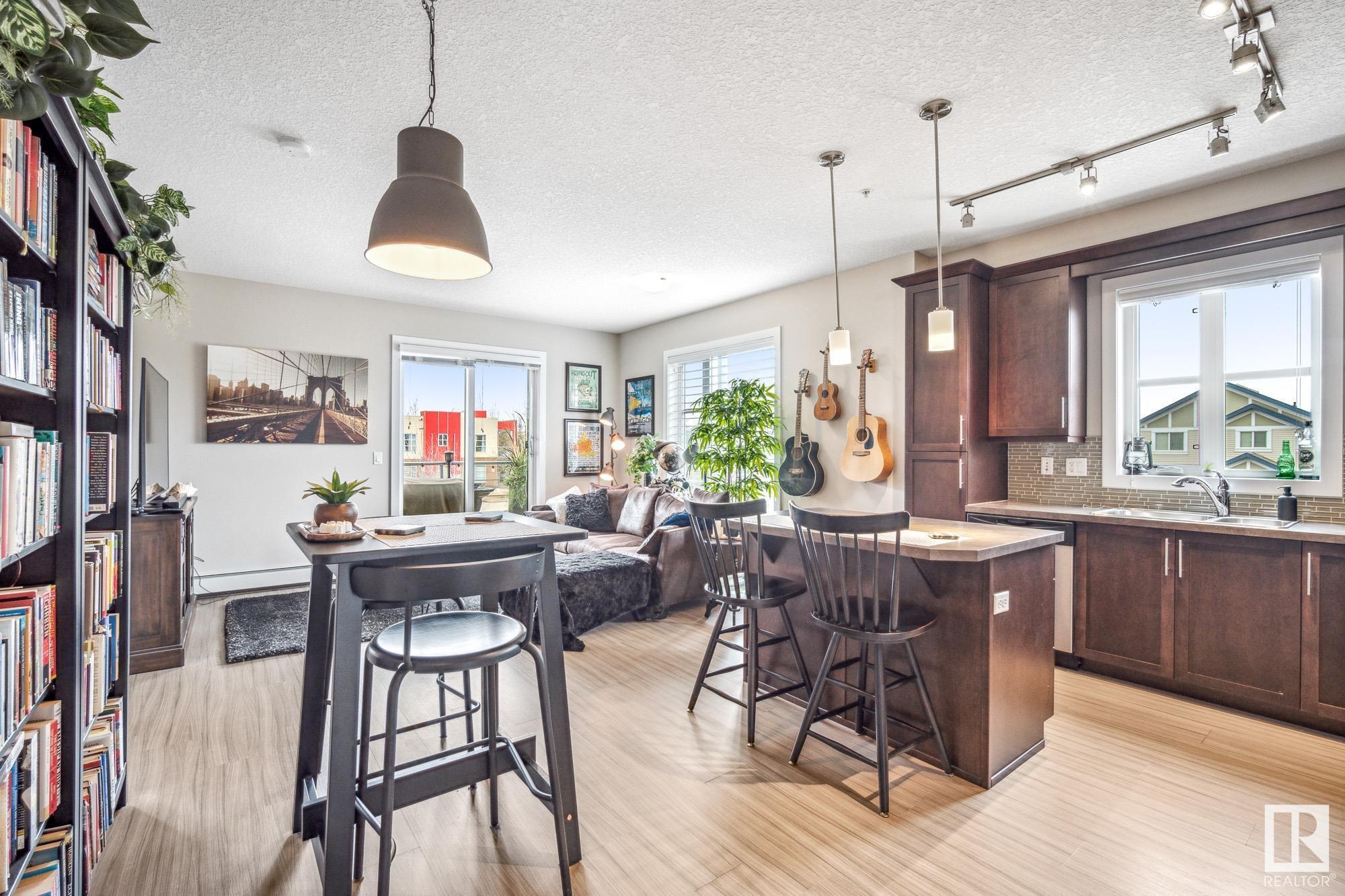 Property Photo: 2588 Anderson Way SW 204 AB T6W 0R2