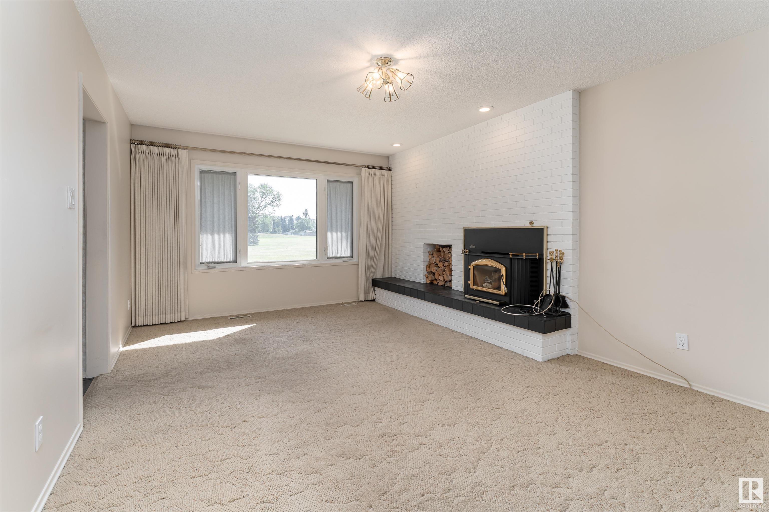 Property Photo:  4720 124 Street NW  AB T6H 3T8 