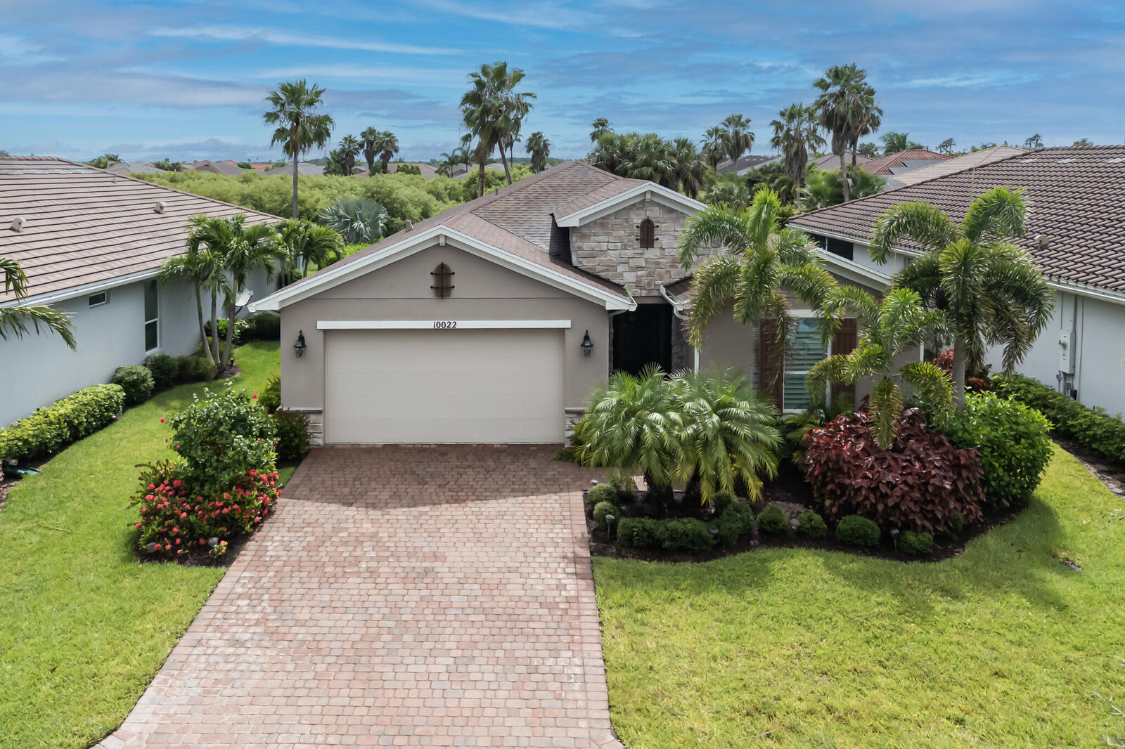 Property Photo: 10022 SW Coral Tree Circle FL 34987