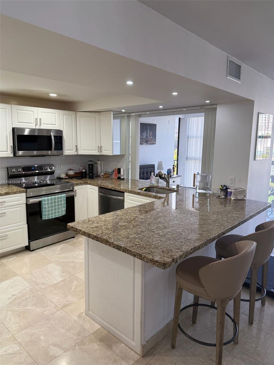 Property Photo:  400 Leslie Dr 404  FL 33009 