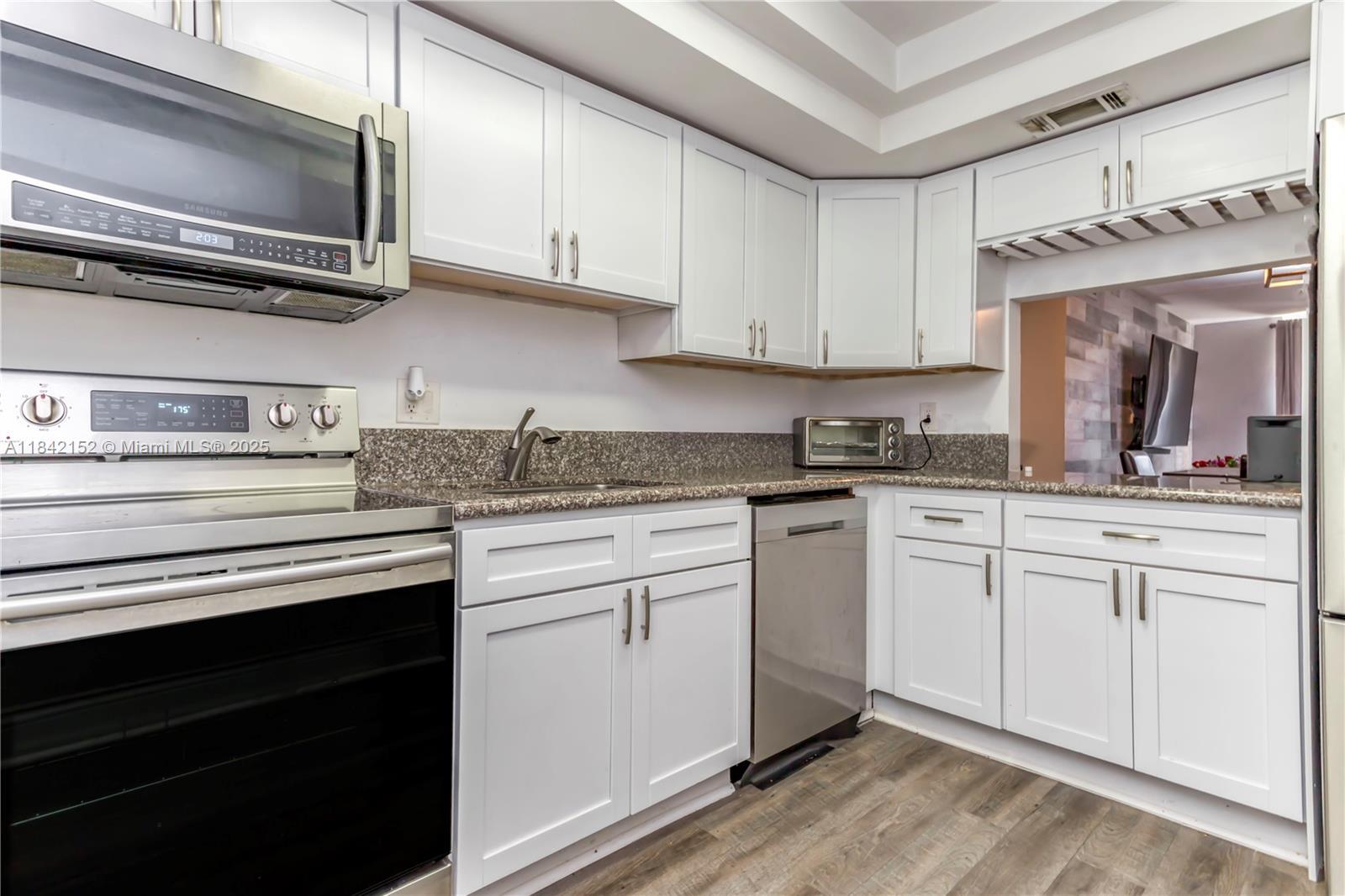 Property Photo:  3490 Foxcroft Rd B203  FL 33025 
