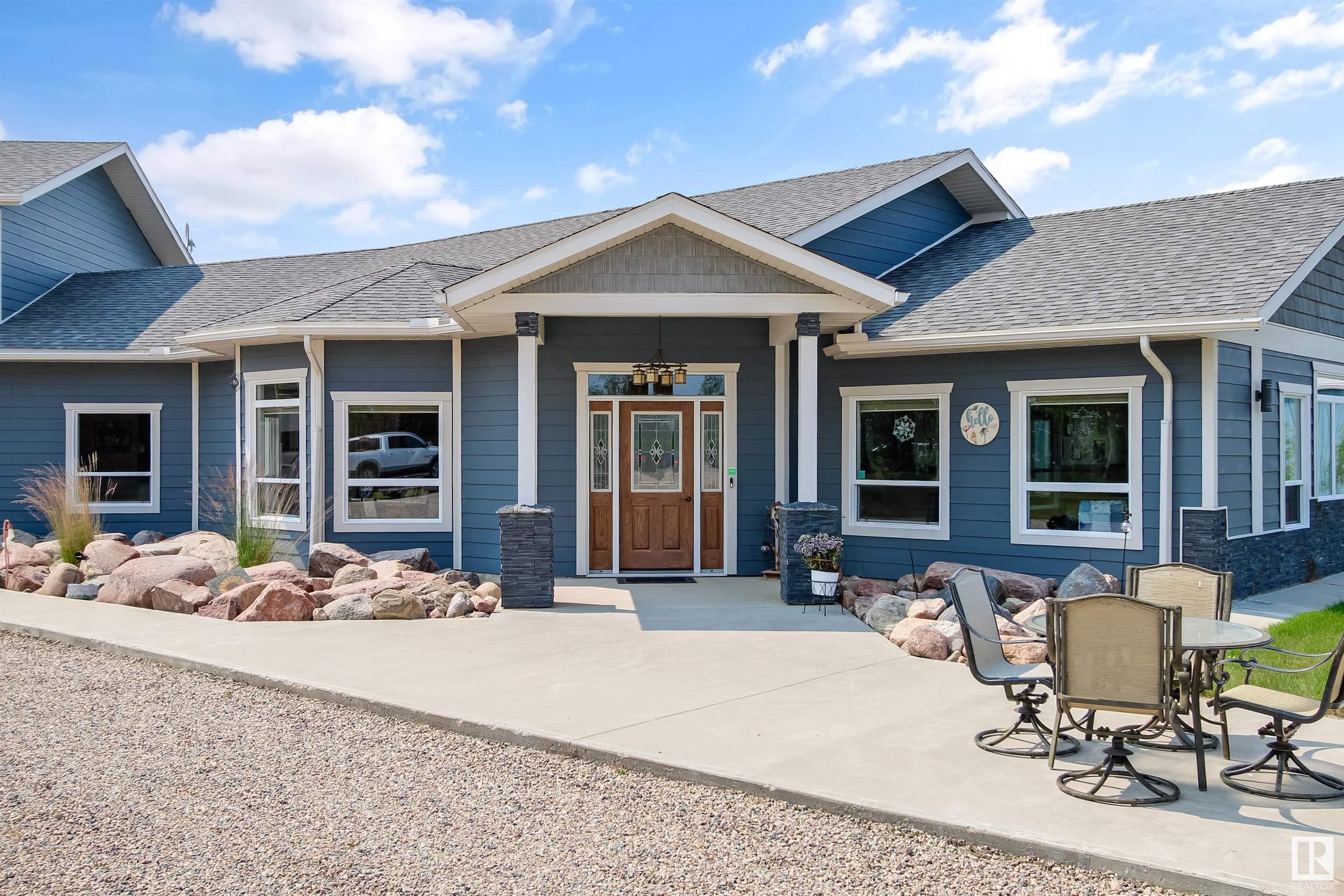 Property Photo: 63006A Rdg Rd 414 AB T9M 1P1