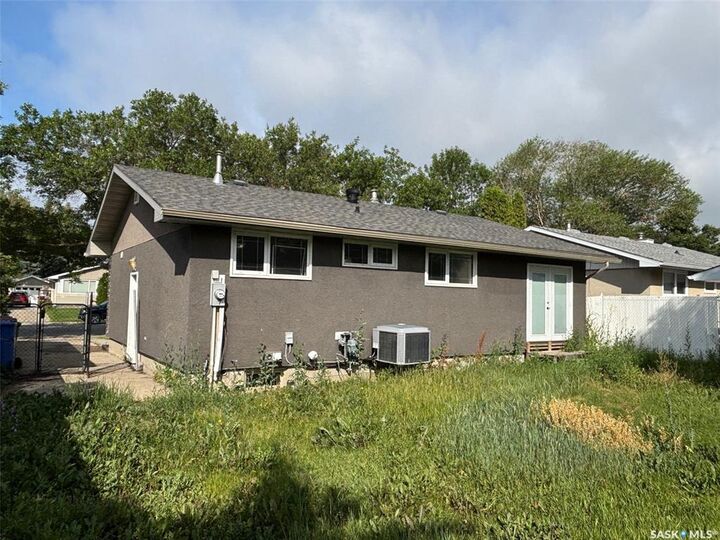 Property Photo: 211 Upland Drive SK S4R 6C6