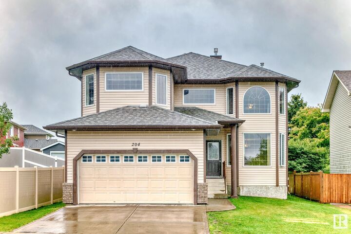 Property Photo:  204 Reichert Drive  AB T4X 0B9 