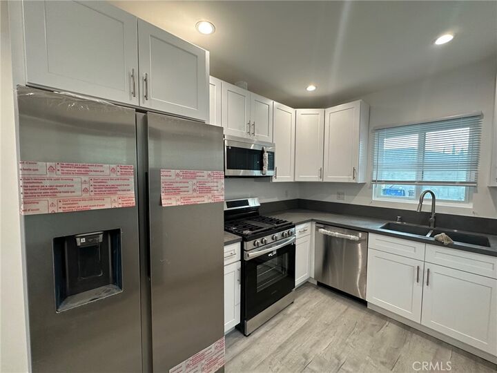 Property Photo:  7016 Bertrand Avenue  CA 91335 