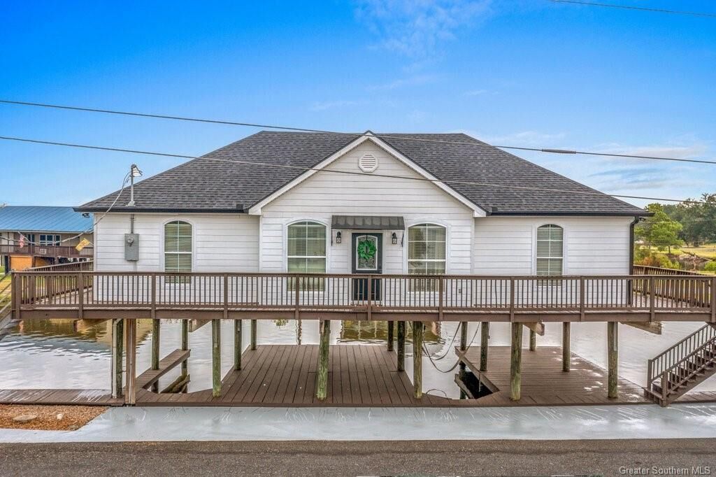 Property Photo:  7238 Pirates Cove  LA 70665 