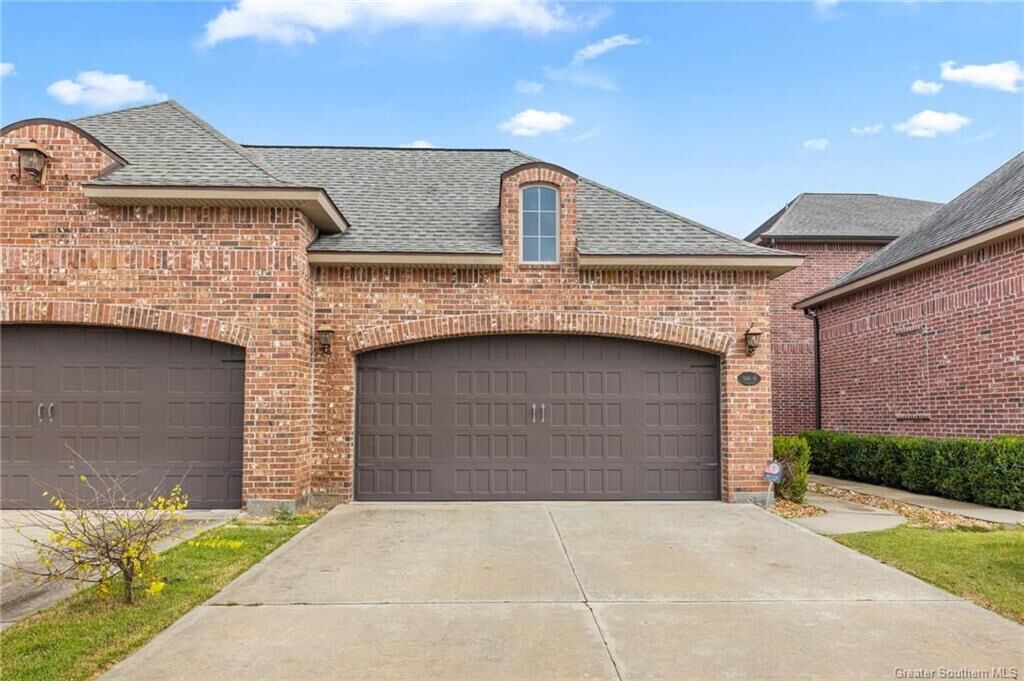 Property Photo: 1550 Lacadie Drive 21 LA 70605