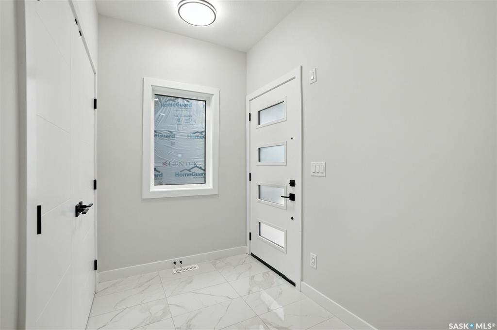 Property Photo:  218 Sharma Lane  SK S7W 0Y4 