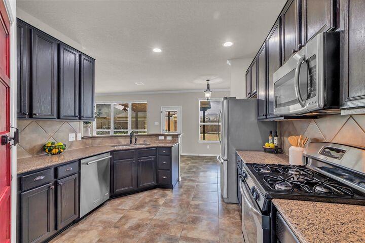 Property Photo:  9976 Cassowary Drive  TX 77385 
