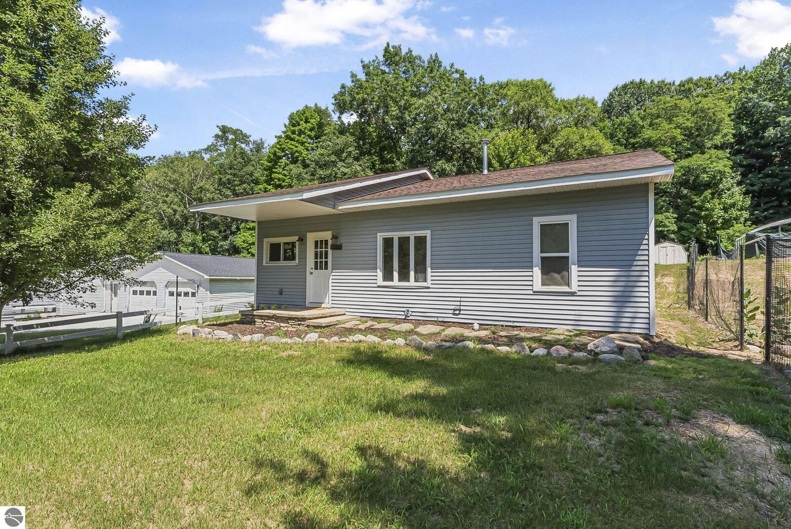 Property Photo:  3760 Five Mile Road  MI 49686 