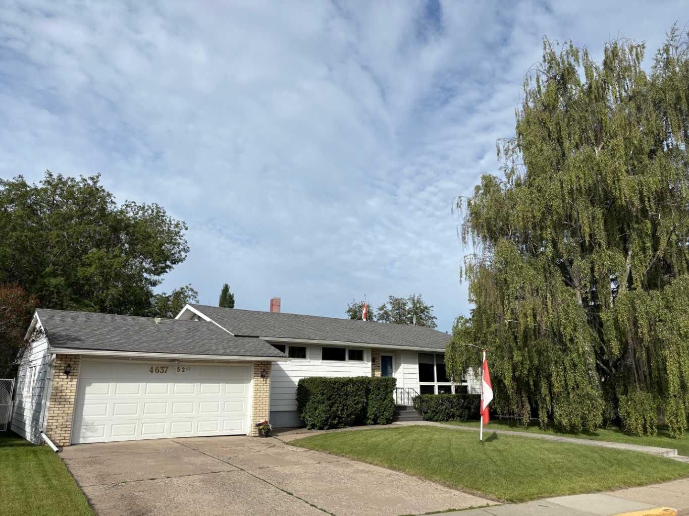 Property Photo: 4637 52 Street AB T4H 1E8