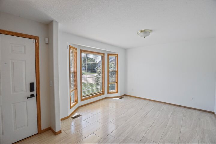 Property Photo:  2401 Emma Avenue  IA 50321