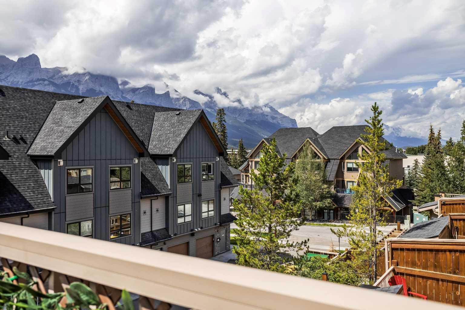 Property Photo: 121 Kananaskis Way 207 AB T1W 0B2