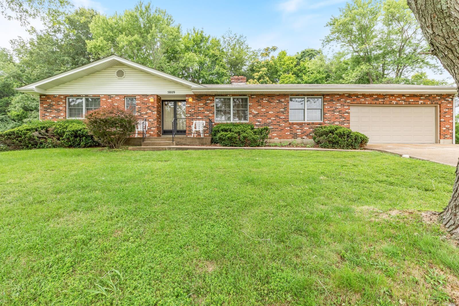 Property Photo: 5809 Runnymede Place MO 63052