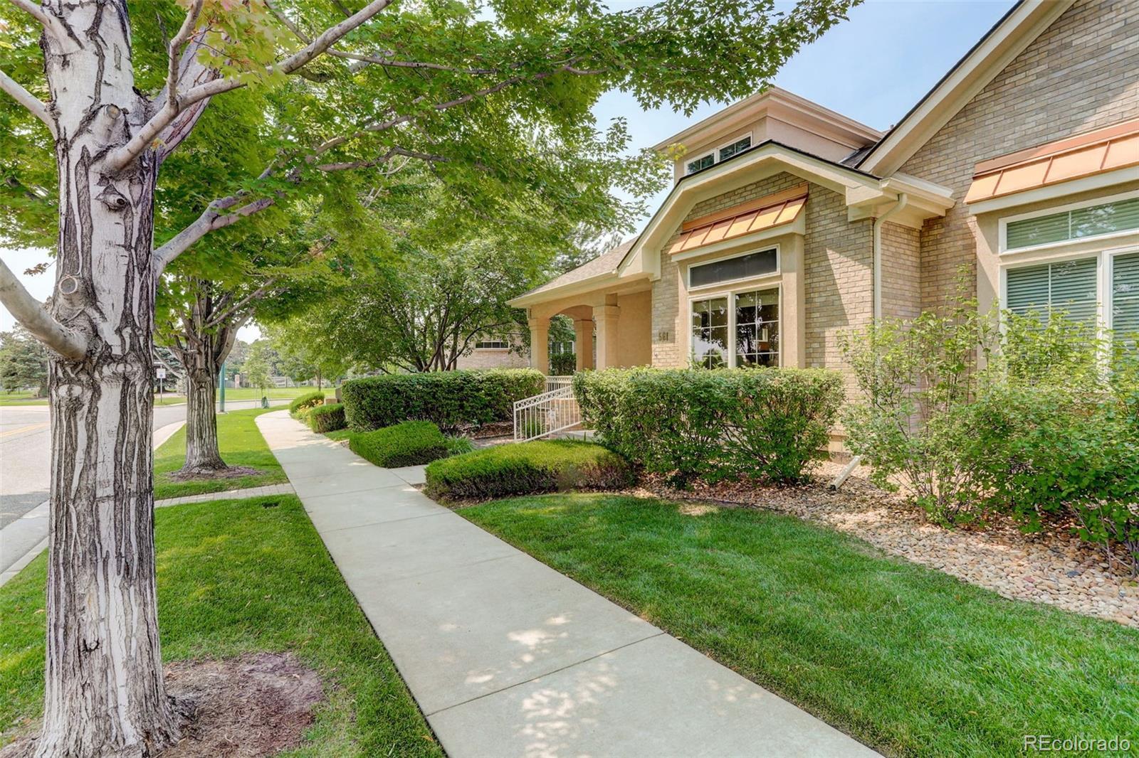 Property Photo:  561 Roslyn Street  CO 80230 