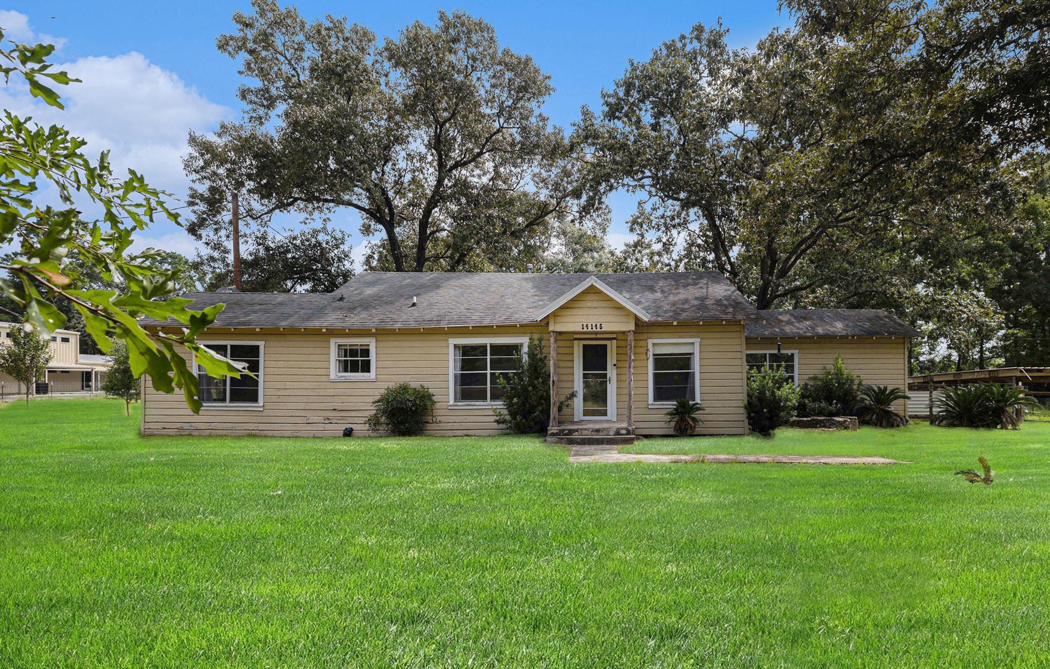 Property Photo: 14145 Bert Brown Rd TX 77302