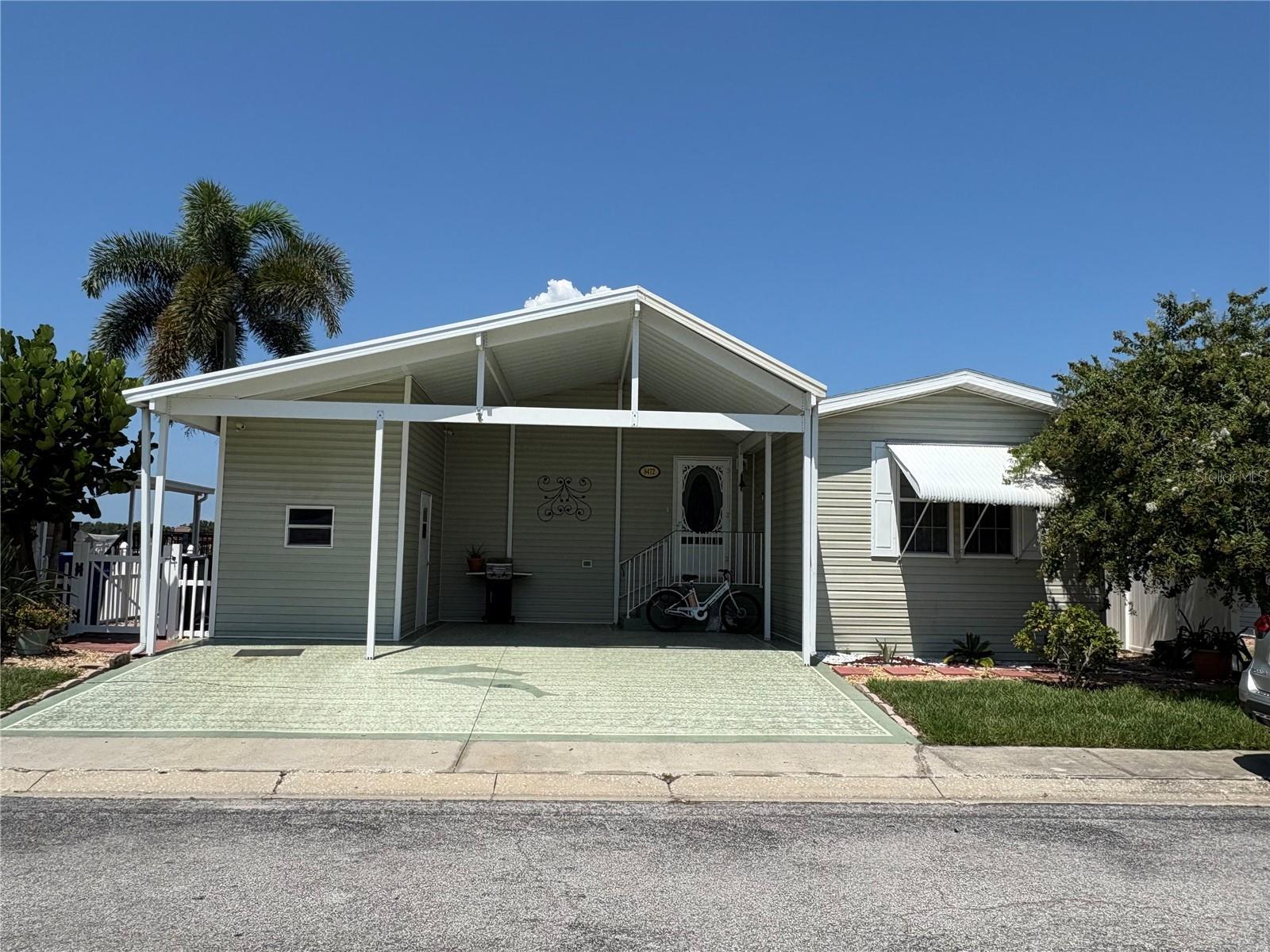 Property Photo: 8472 Fantasia Park Way FL 33578