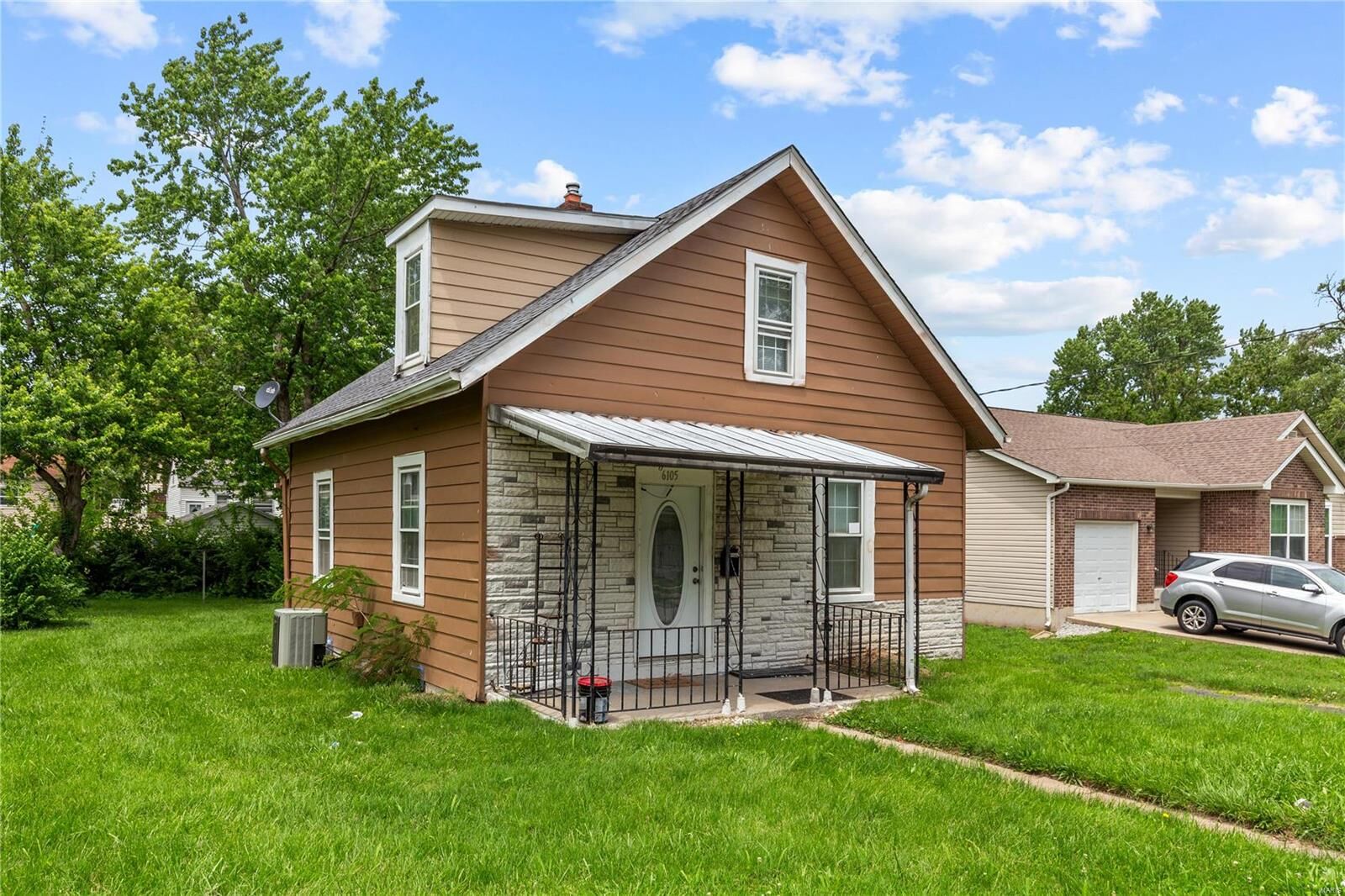 Property Photo:  6105 Washington Ave  MO 63134 
